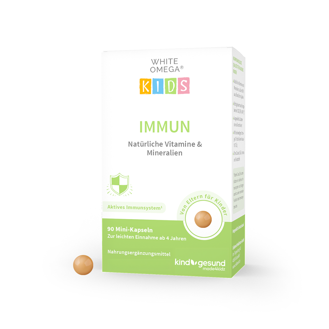 Verpackung der WHITE OMEGA KIDS Immun und eine Mini-Perle
