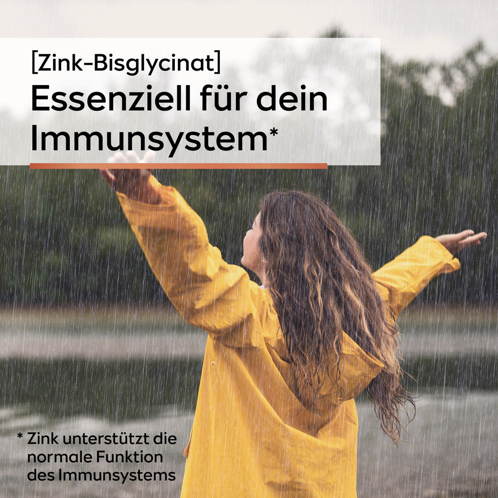 Glückliche Frau im Regen - Zink-Bisglycinat - Essenziell für dein Immunsystem