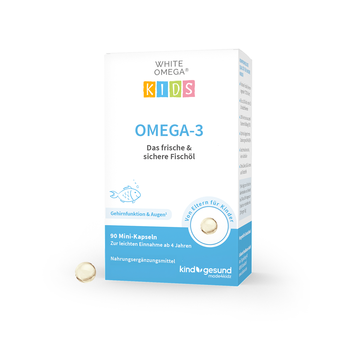 White Omega Kids Verpackung mit einer Pearlz-Kapsel im Vordergrund